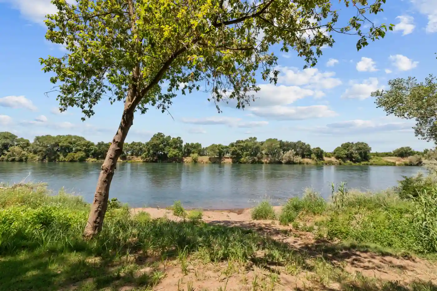 A big-rig friendly RV site with river frontage on the Sacramento River at Hidden Harbor